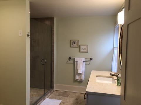 Bathtub, hair dryer, heated floors, towels