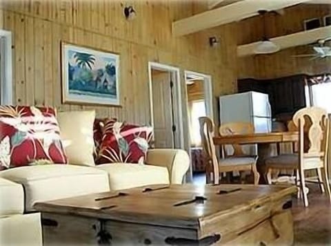 Living room looking to dining and kitchen area