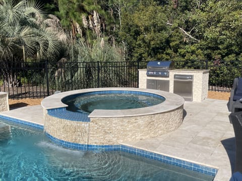 Outdoor pool, a heated pool, sun loungers