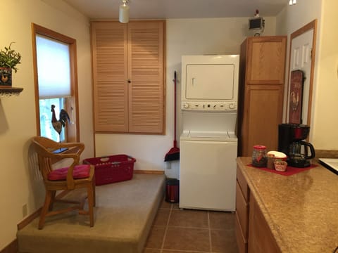 Laundry Center located in kitchen.