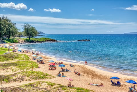 On the beach, sun loungers, beach towels