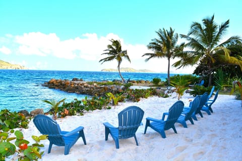 On the beach, sun loungers, beach towels