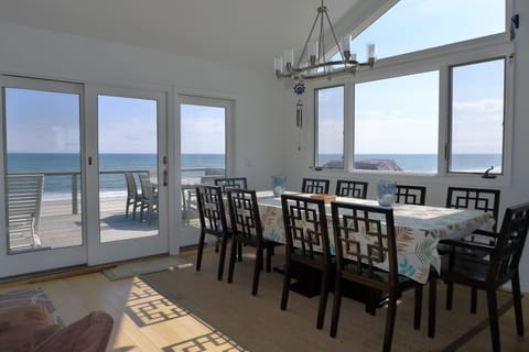 large dining table with seating for 9 and ocean views!