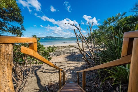 On the beach, sun loungers, beach towels