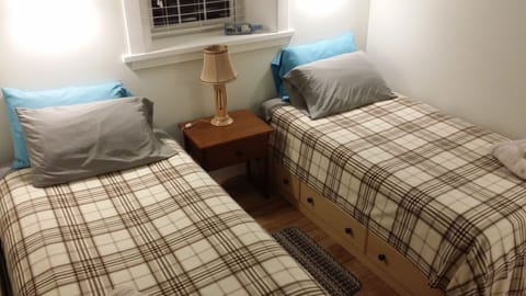 Captains beds in the second bedroom provide extra storage in their drawers.