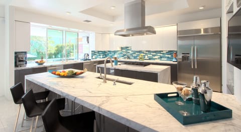 Chef’s kitchen: 2 dishwashers, 3 sinks, 2 frigs, 6 burner gas stove, 2 ovens