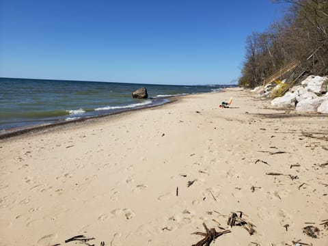 On the beach, sun loungers, beach towels