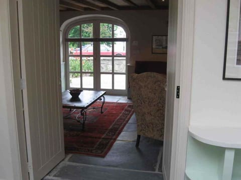 Arched Window of Living Room at front of the cottage.