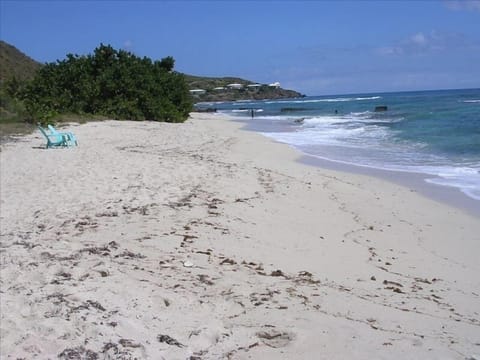 On the beach, sun loungers, beach towels