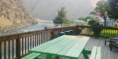 Relax on our big deck that overlooks the beautiful Salmon River