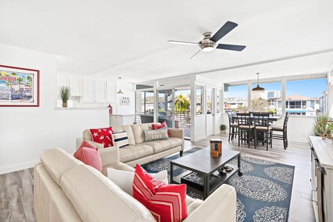 Experience the serenity of our bayfront upstairs retreat overlooking one of Newport Harbor's quiet side channels.
