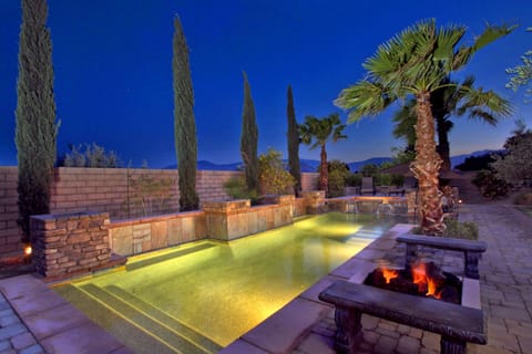 There are outdoor fire pits for evening and night relaxing by the pool