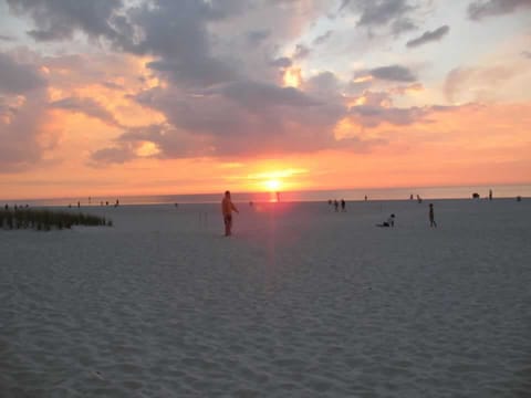 On the beach, sun loungers, beach towels