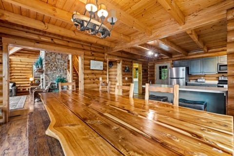 dining area with view into living room and open to kitchen