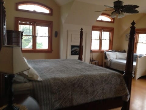 Master br w/ a king bed and single bed.  French doors lead to 2nd story veranda