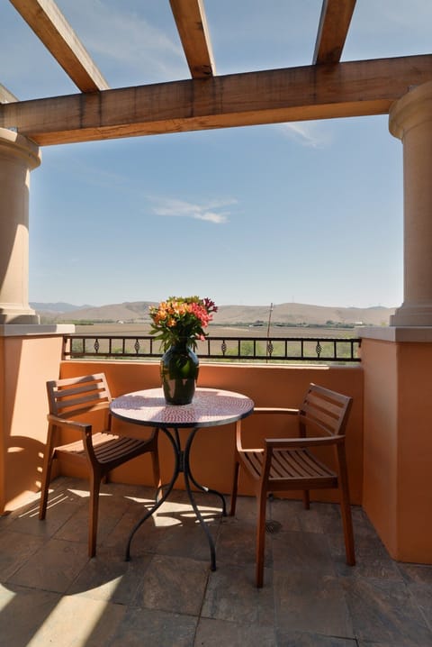 The balcony has nice views of the surrounding hillside