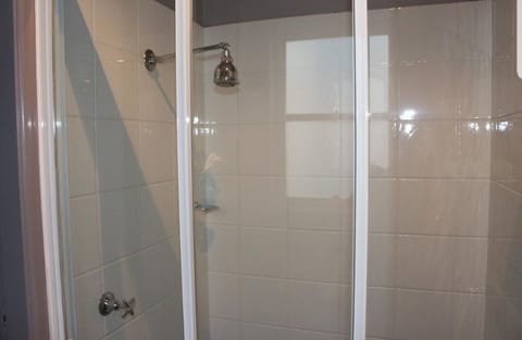 Combined shower/tub, hair dryer, towels, soap