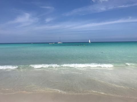 On the beach, sun loungers