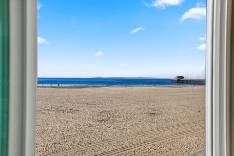 On the beach, sun loungers, beach towels