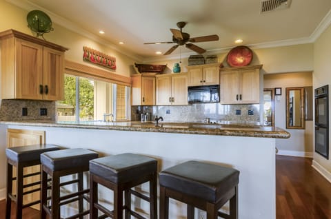 There is also bar seating as well as an outside dining on the screened in lanai.