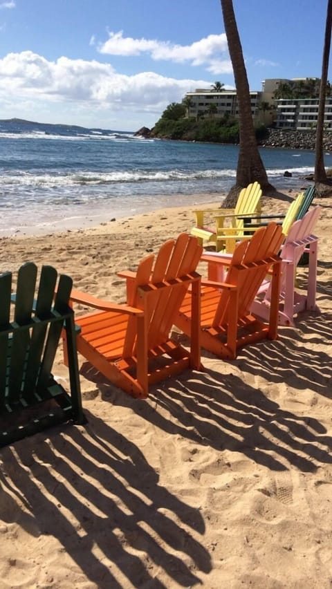 On the beach, sun loungers, beach towels