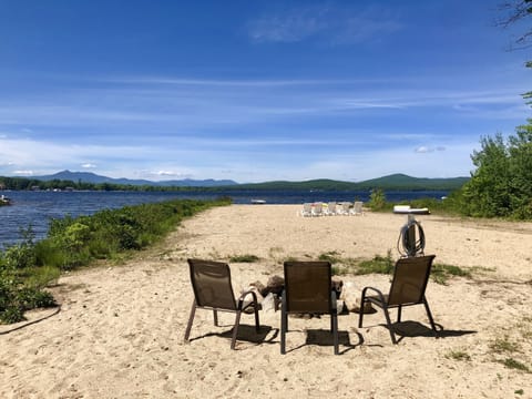 On the beach, sun loungers, beach towels