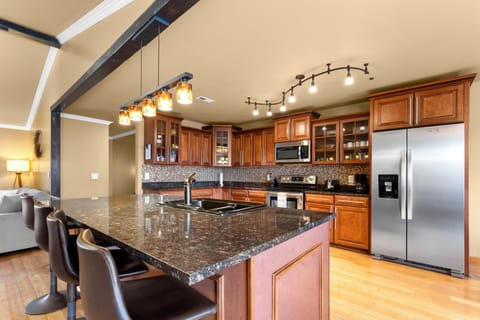 Large kitchen with granite countertop