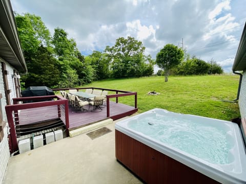 Large private backyard, with gas grill and hot tub