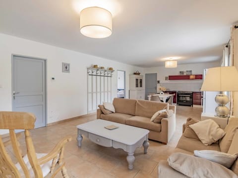 Furniture, Table, Property, Couch, Picture Frame, Interior Design, Beige, Lamp, Flooring, Wood