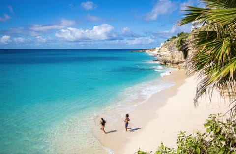 On the beach, sun loungers, beach towels