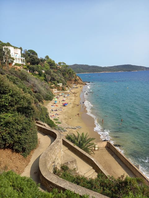 Beach nearby, sun loungers