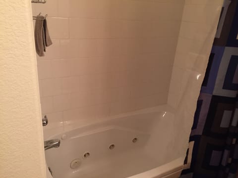 Shower, jetted tub, hair dryer, towels