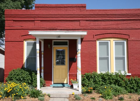 Comfortable turn of the century renovated row house by the river and downtown.
