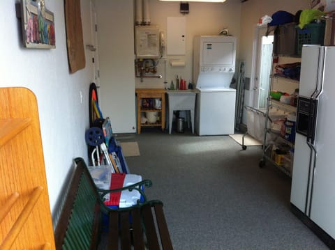 IMMACULATE GARAGE with plenty of room to store beach gear, bikes or for kid play