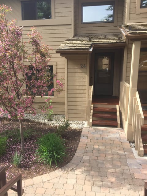 Path with pavers from condo all around Ridge, beautiful wood front door w/screen