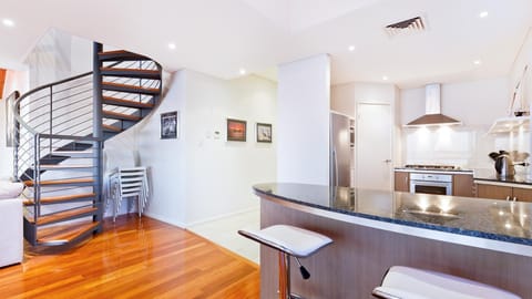 Kitchen - with stair to upper mezzanine 