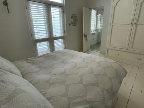 Iron/ironing board, travel crib, bed sheets, wheelchair access