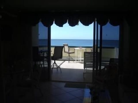 Living room to beachfront balcony