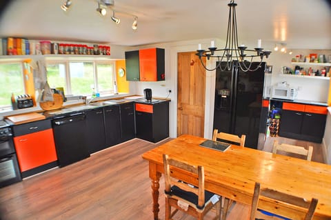 …with Dining table and large Fridge/Freezer