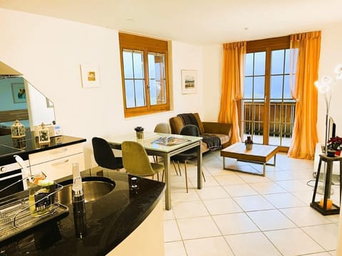 Kitchen with Dining- and Living Room