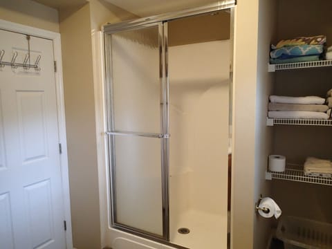 Combined shower/tub, hair dryer, towels, toilet paper