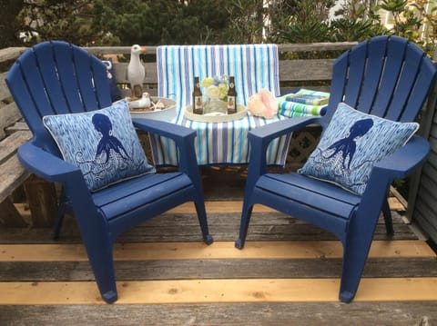Front deck with Adirondack chairs from back yard.  