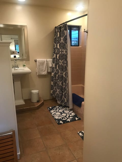 Combined shower/tub, hair dryer, towels, soap