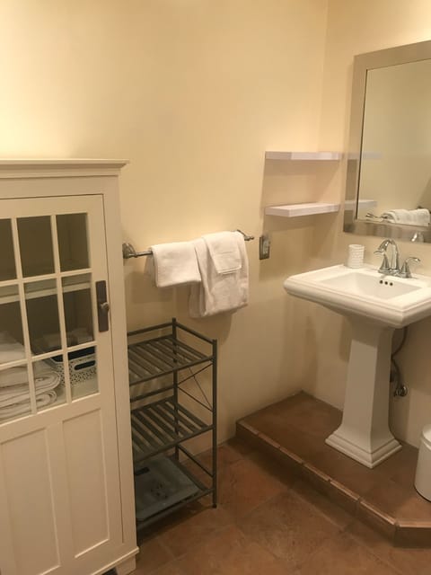 Combined shower/tub, hair dryer, towels, soap