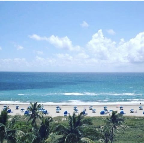 On the beach, sun loungers, beach towels