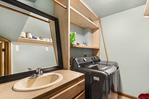 Combined shower/tub, hair dryer, towels, toilet paper