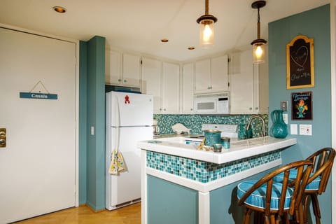 A new bar (2 bar stools) helps with the flow during cocktail hour!