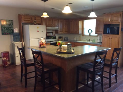 View of kitchen with bar seating