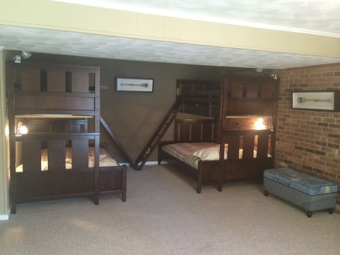 Bedroom 4 with two sets of twin over full bunkbeds.