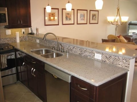 Sparkling Quartz Countertop with sparkling ocean in the background.